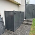 Woodland Grey vertical aluminium slat fencing