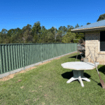 Metline colorbond fencing with 200 x 50 concrete sleeper fitted