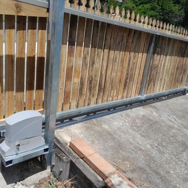 TIMBER PALING SLIDING GATE WITH ELEVATED MOTOR