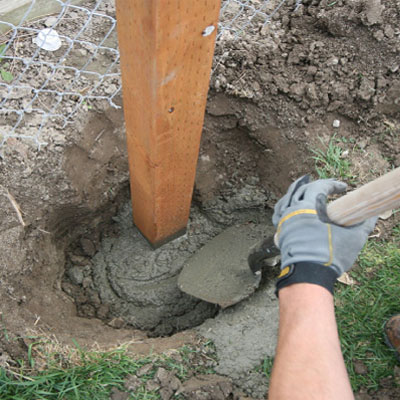 Concrete footings for fence posts