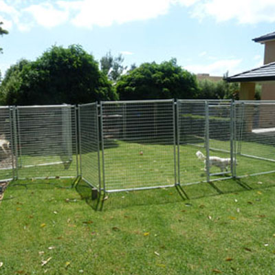 Backyard pet enclosure fence installation