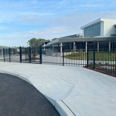 Steel palisade security fence installed at appropriate height for commercial site