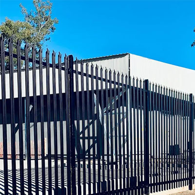 Commercial yard secured with high-visibility palisade boundary fencing