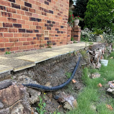 Why Retaining Walls Start to Shift Over Time - Drainage