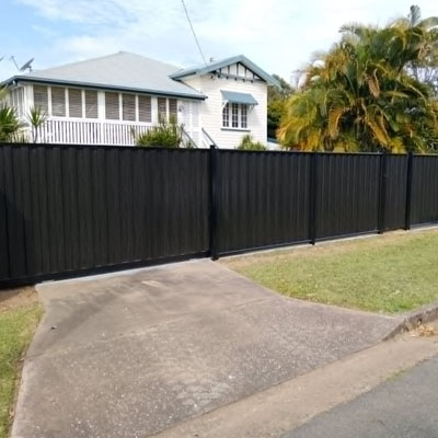 Timber-Look Fencing and Gates for Consistent Outdoor Design - Matching fence and gate
