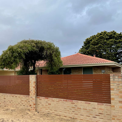 Timber-Look Fencing Without the Ongoing Timber Upkeep - Timber-look steel fencing
